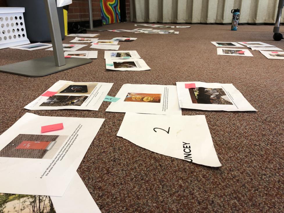 Student photos on the floor